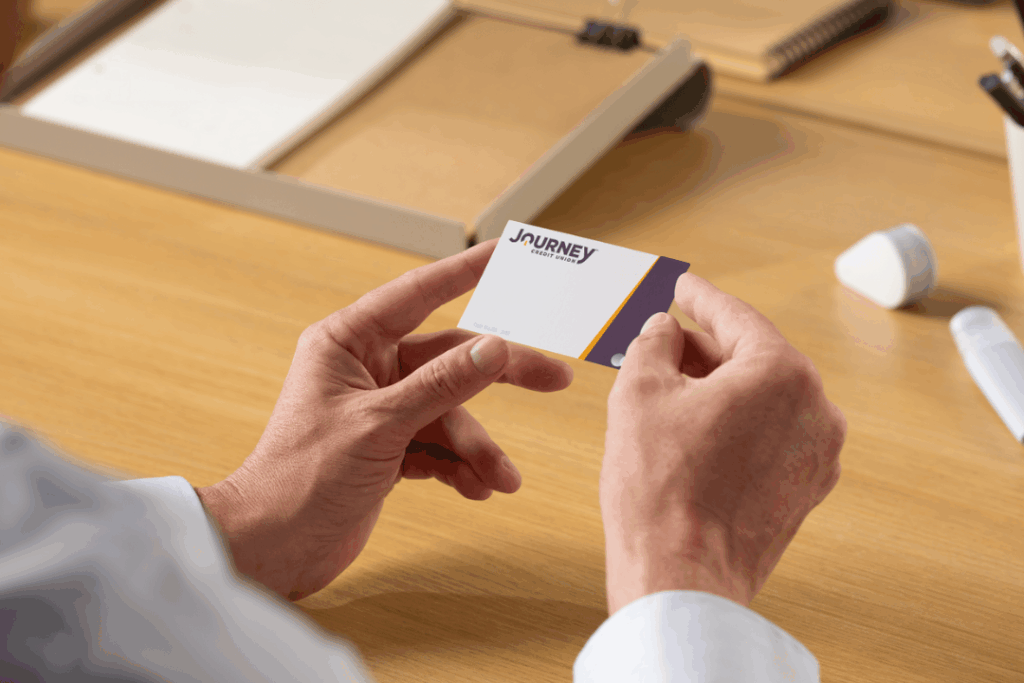 Man Holding JCU Credit Card